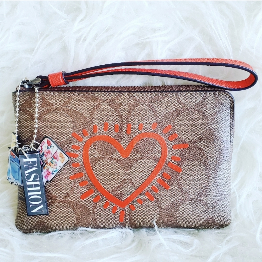 Coach cute fashion wristlet in brown leather